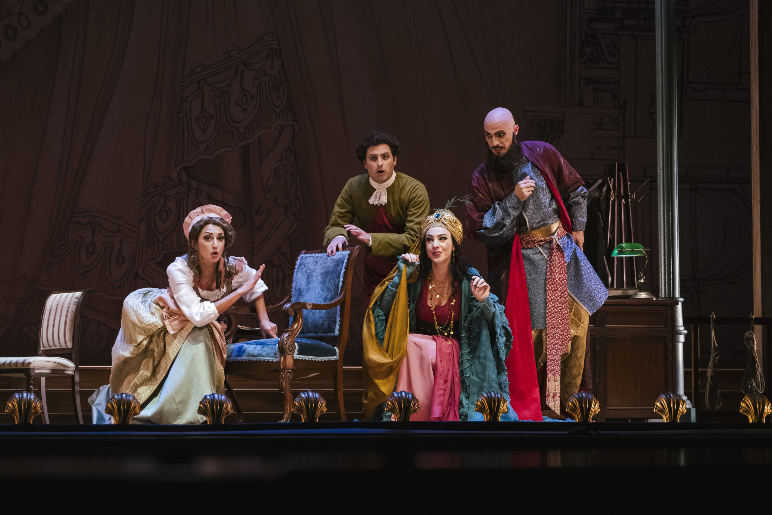 Elenco de Adriana Lecouvreur de Cilea en una escena de la producción de ABAO Bilbao Opera